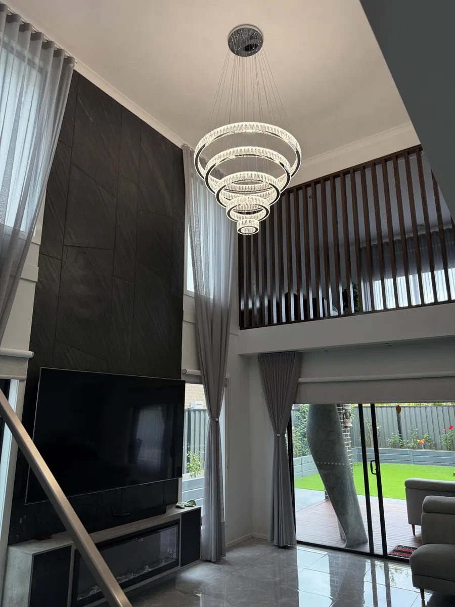 Completed chandelier installation by AmpTek Electrical Solutions